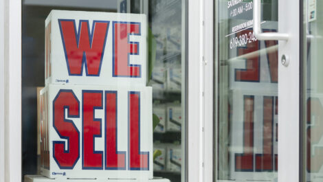 View of "we sell" sign at U-Stor-It self storage facility.