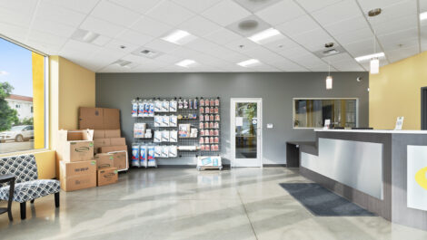 Storage boxes and household items neatly organized in a room at U-Stor-It.