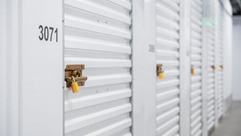 View of indoor storage units at U-Stor-It self storage facility, view of unit lock.