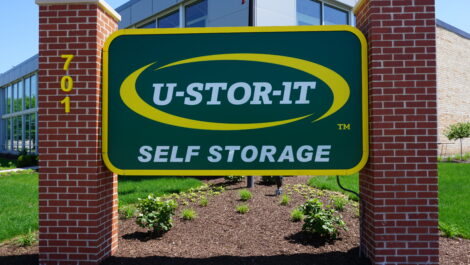 View of sign at U-Stor-It self storage facility.