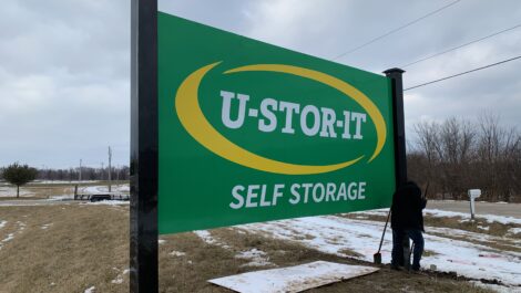 View of sign at U-Stor-iT self storage facility.