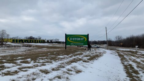 View of sign at U-Stor-iT self storage facility.