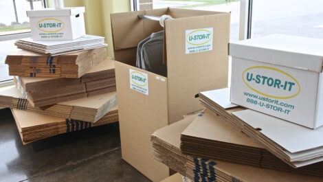 Interior of self storage boxes at U-Stor-It facility, view of office.